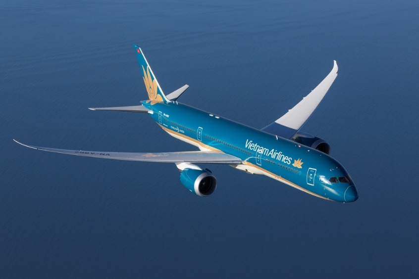 Máy bay Vietnam Airlines lướt êm giữa bầu trời xanh, nối liền Bắc Kinh và Đà Nẵng (Nguồn: Internet)